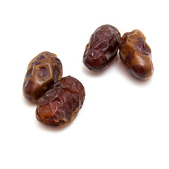 Medjool dates isolated on a white background.