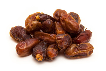Medjool dates isolated on a white background.