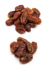 Medjool dates isolated on a white background.