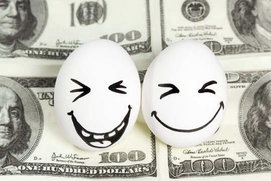 Eggs with faces on money