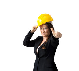 female engineer with helmet makes approval gesture over white