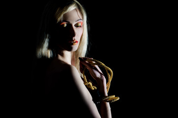Naklejka premium Beautiful girl with a rope and bright makeup