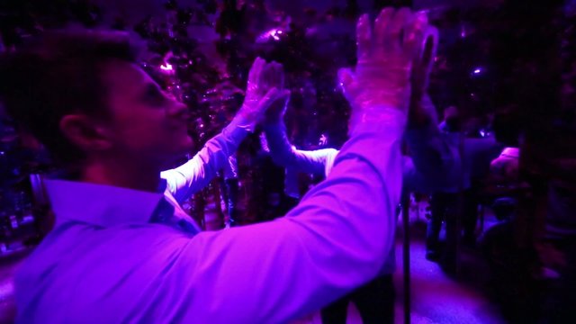 Man walk the mirror labyrinth illuminated stroboscopic lights