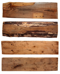 Four old wooden boards isolated on a white background. Old Wood