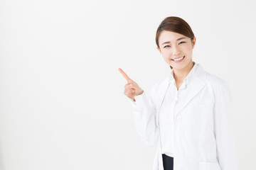 young asian doctor on white background