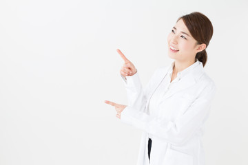 young asian doctor on white background