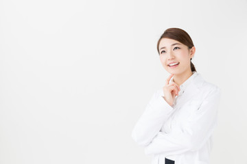 young asian doctor on white background