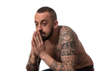 Man With Tattoo And Beard On White Background