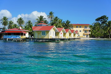 Fototapeta na wymiar Tropical resort with cabin over water
