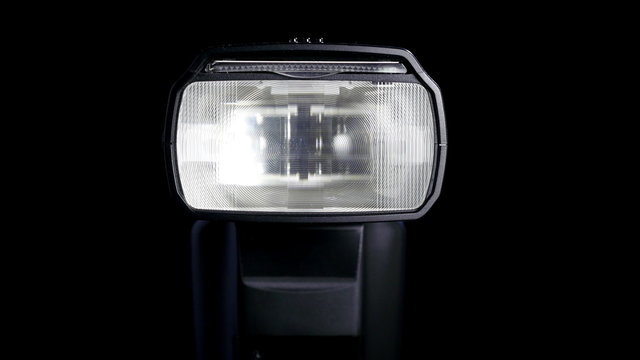 Operation of automatic flash of the DSLR camera. 4K UHD.