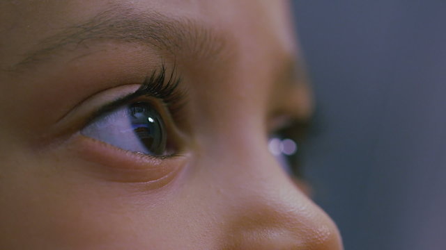 Eyes of a young child engrossed in something