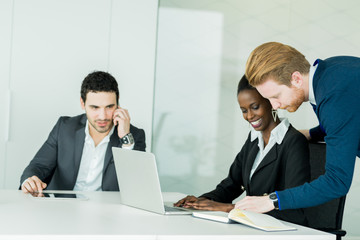 Business people during work in a clean white office
