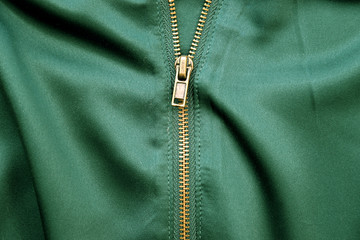 Gold Zipper on Green Silk Cloth