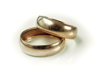 Wedding rings on a white background.