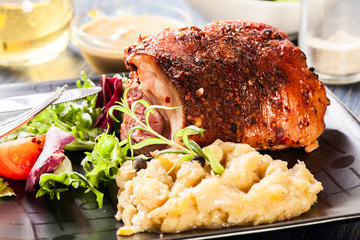 Pork knuckle with fried sauerkraut