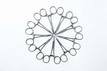 Circle made of neatly arranged surgical instruments
