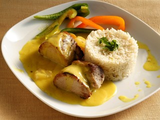 pork meat with curry sauce,rice and peppers