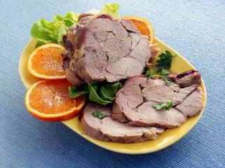 rolled turkey meat and roasted as dinner meal