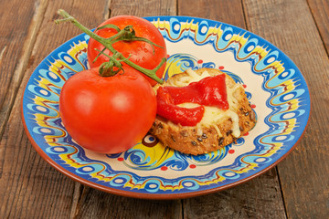 Sandwich with tomatoes on a plate
