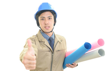 ガッツポーズの作業員