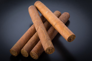 Cuban cigars on black background
