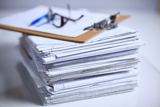 Big stack of papers ,documents on the desk