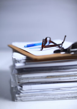 Big stack of papers ,documents on the desk