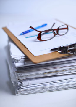 Big stack of papers ,documents on the desk
