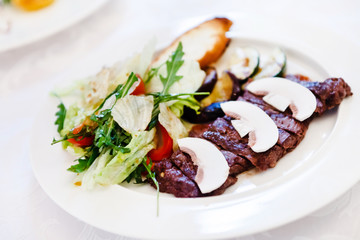 steak with vegetables