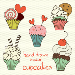 Set of hand drawn doodle cupcakes