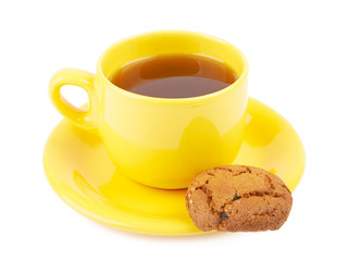 Cup of tea and chocolate cookies on a white background isolated