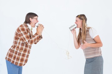 Geeky hipsters using string phone