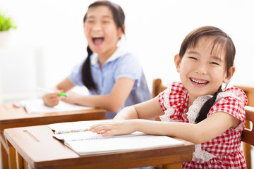 happy children study in the classroom