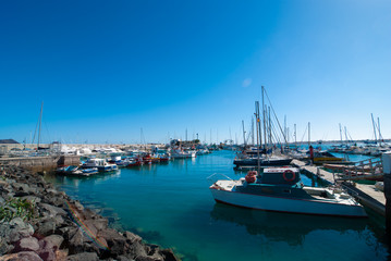 Fototapeta premium Yachts in Corralejo port on Fuerteventura Canary Island
