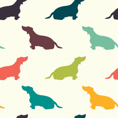 Sitting dogs silhouettes seamless pattern.