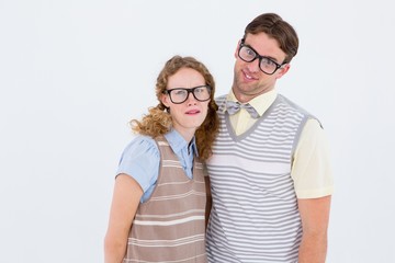 Happy geeky hipster couple with silly faces