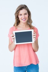 Hipster woman showing tablet pc