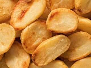 Fototapeta na wymiar crispy roasted potato food background