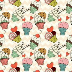 Cartoon cupcakes seamless pattern on chevron