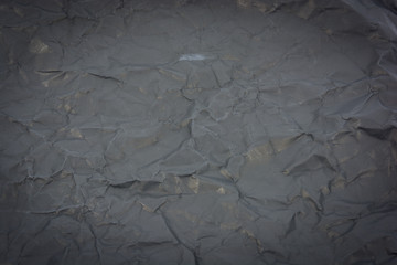 Close up dark black paper surface