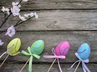 Easter background with eggs and flowers