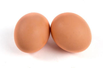 Two eggs isolated on white background