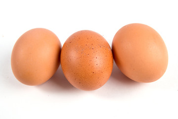 Three eggs isolated on white background