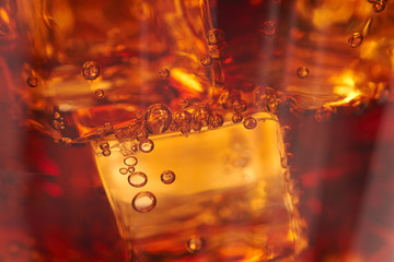 cola with ice cubes