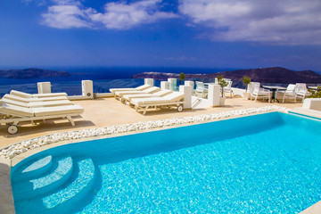 Fototapeta na wymiar Amazing swimming pool, Imerovigli, Santorini, Greece