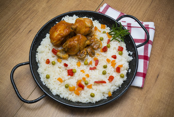 Arroz y muslos de pollo