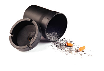 Black ashtray for car, ash and cigarette butts, white background