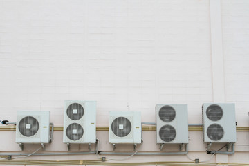 Air compressor fan ventilator on wall.