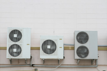 Air compressor fan ventilator on wall.