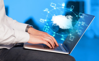 Hand working with a Cloud Computing diagram